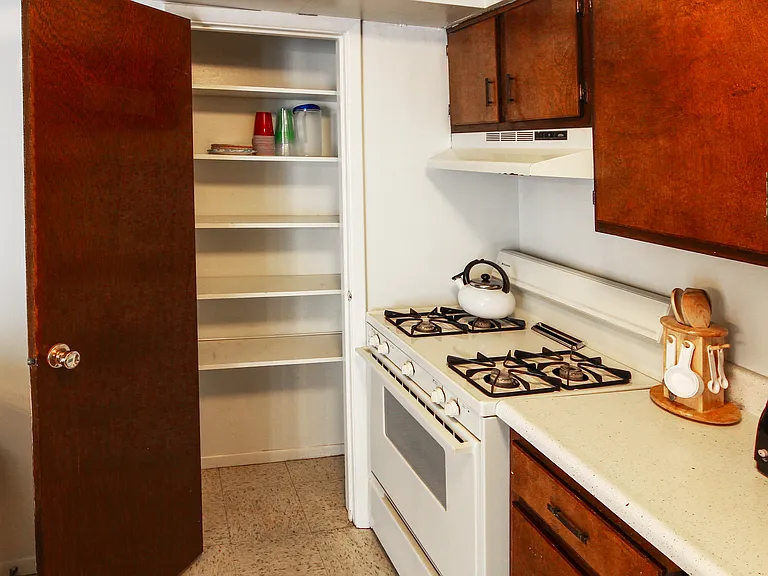 Hunter Ridge Apartments - Kitchen pantry for extra storage