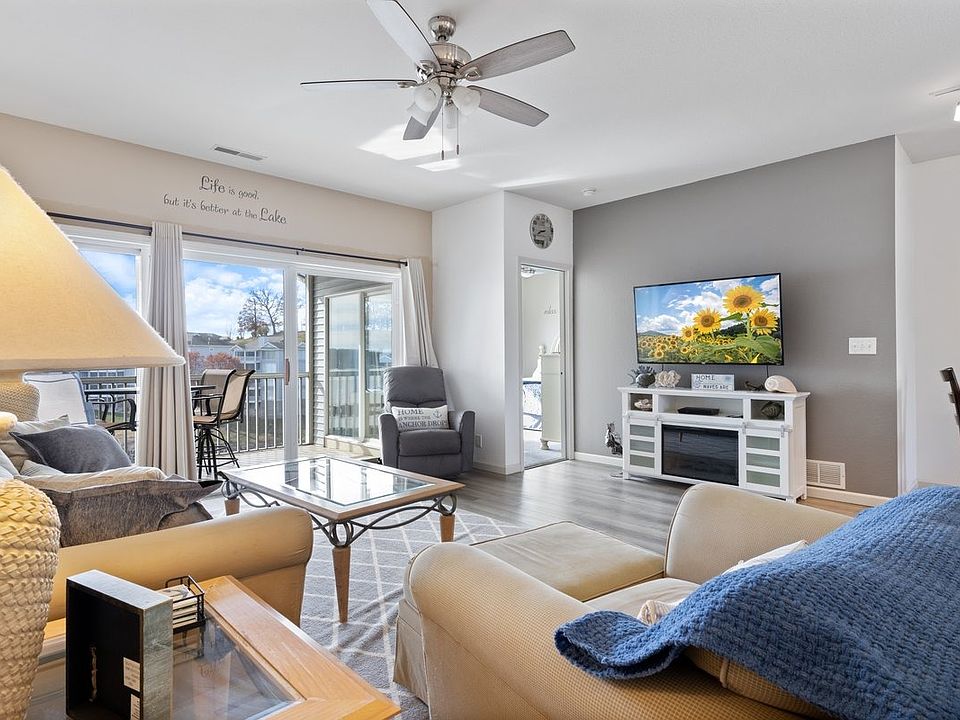 Living room leading to screened deck.