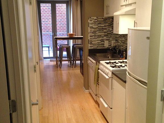 Kitchen w/ Curtains Open