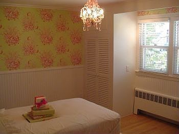 Built ins give this bedroom 3 closets! Thibut fine wallpapers