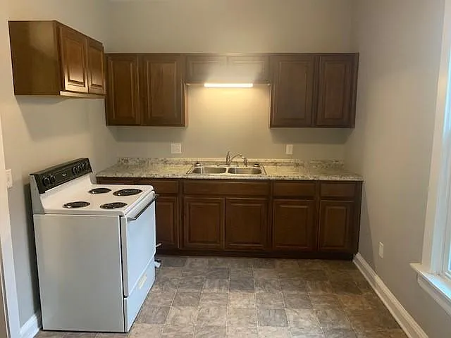 One half of kitchen, new cabinets.