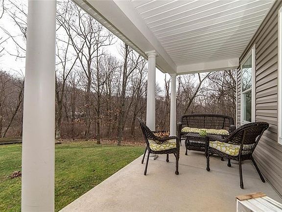 SPACIOUS PRIVATE FRONT PORCH.