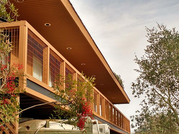 Back deck runs along entire house.