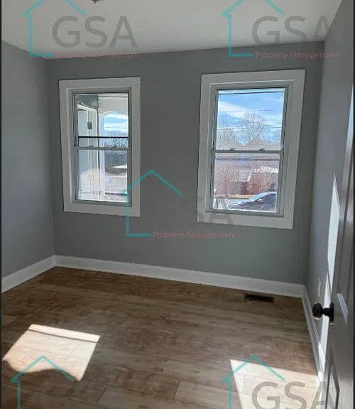 694 Saxon Ave — Photo 15