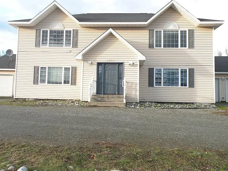 Front of the fourplex; this unit is the bottom left one.
