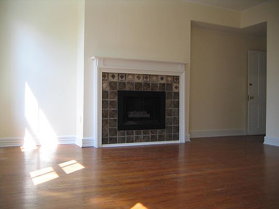 Master bedroom leading to en suit bathroom