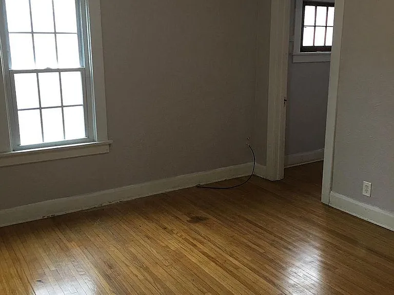 Bedroom #2 with a WALK- IN CLOSET and hard wood flooring!