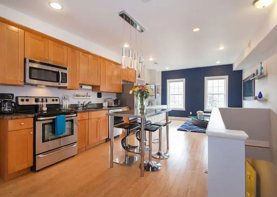 Open concept kitchen, living, dining room. Offered furnished as you see here.