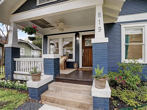 Inviting front porch for year-round entertainment and socializing with amazing neighbors.