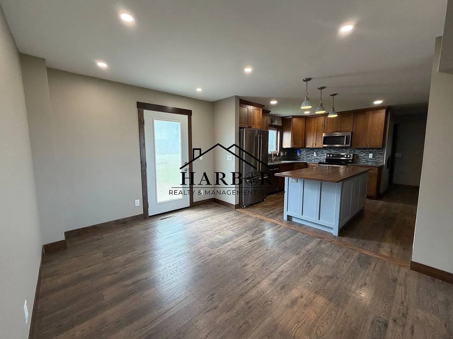 *1/2 Off First Months Rent* Spacious 3BR Home with 2-Stall Garage & Private Deck in Kasson — Photo 2