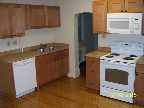 Kitchen with built-in dishwasher & cabinets