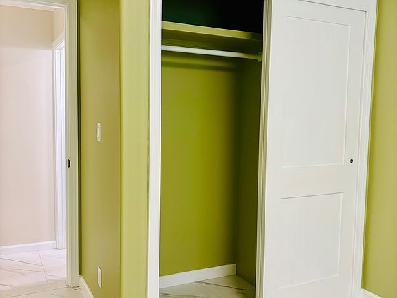 closet inside bedroom 2