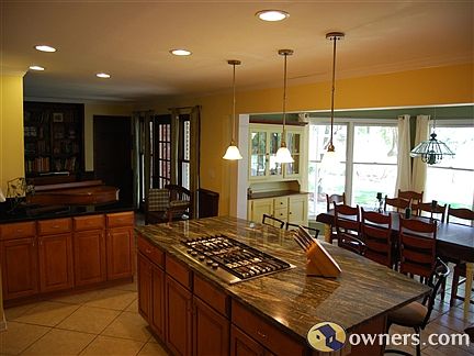 kitchen, plenty of storage & counter space,180 view of creek