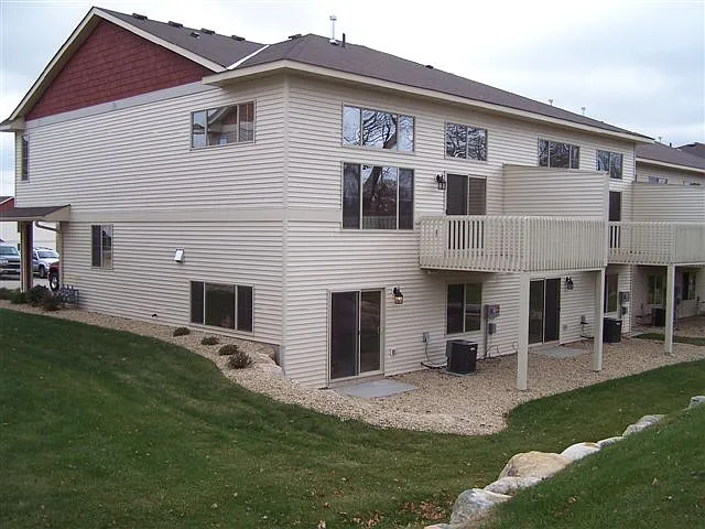 Side and back of home. Walkout from lower level