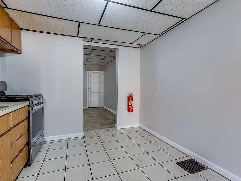 1202 Woodland Ave — Photo 12