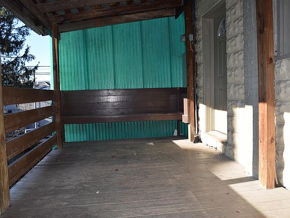 Large porch outside the front door.