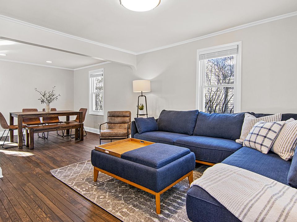 View from front door through living room, into dining room