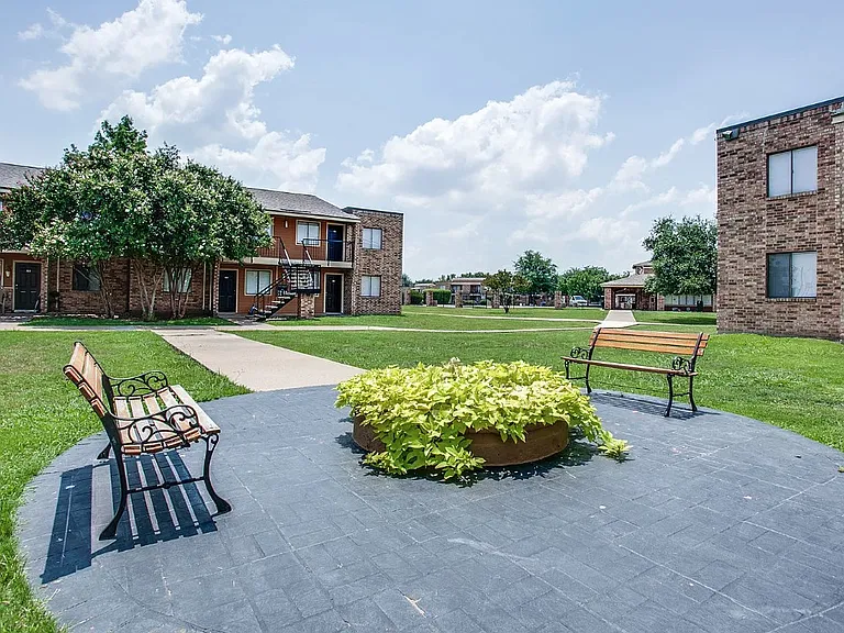 Shaded trees and walking area throughout the property