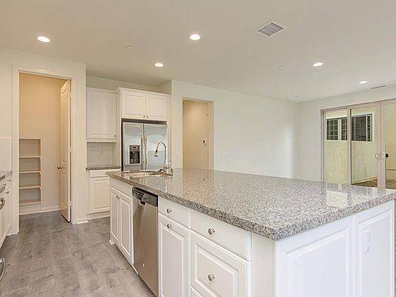 Stainless Steel Appliances and large pantry