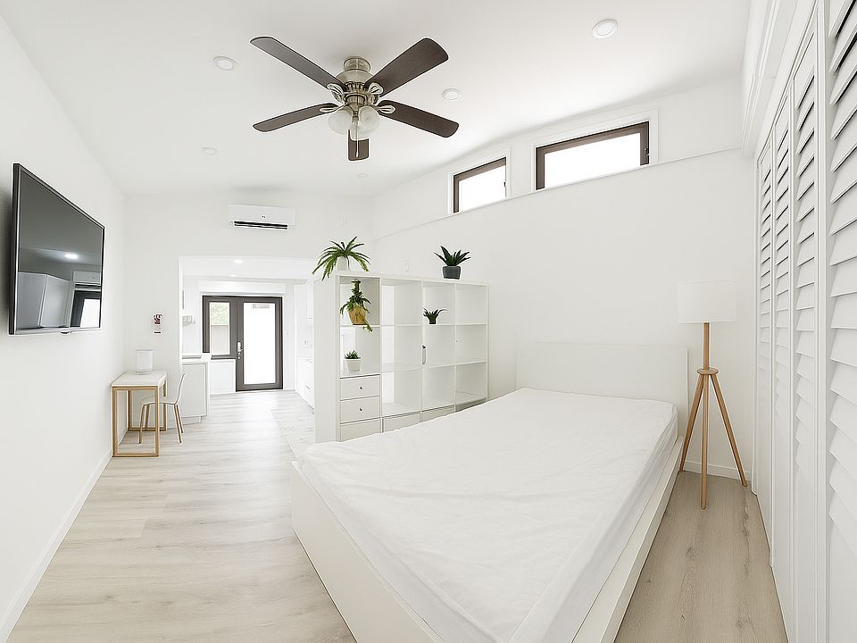 Movable TV arm allows easy viewing from bed or couch.