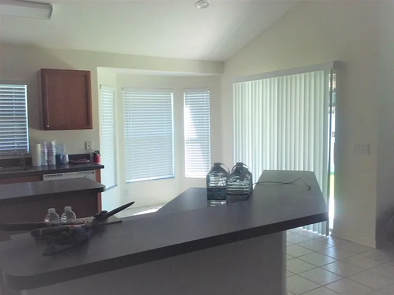 Bump-Out dining area in Kitchen & Sliding Glass doors leading to the Patio Space (10'x10') in back yard.