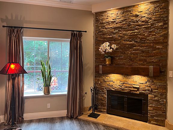 Gas / wood burning open fireplace.