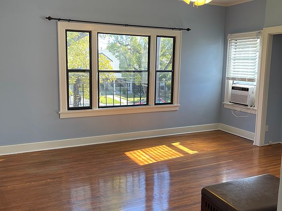 View of Living Room windows and carved-out space along south wall perfect for your TV setup.