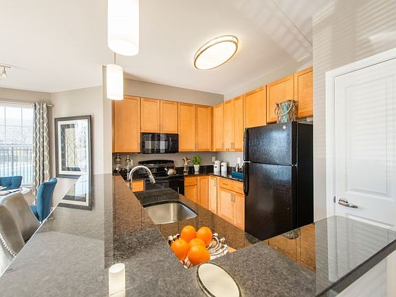 Modern, Fully-Equipped Kitchens with Granite Countertops