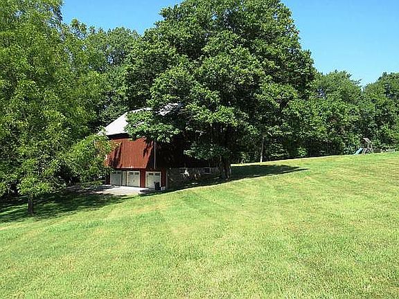 view of barn in summer