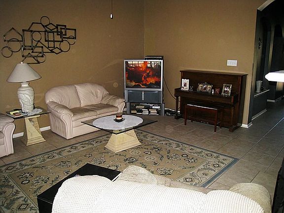 Large 20x15 Den with tile floors and high ceilings