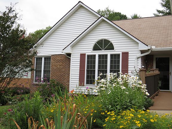 English style gardens that bloom from February until October. The gardens will be maintained by the owner of the home.