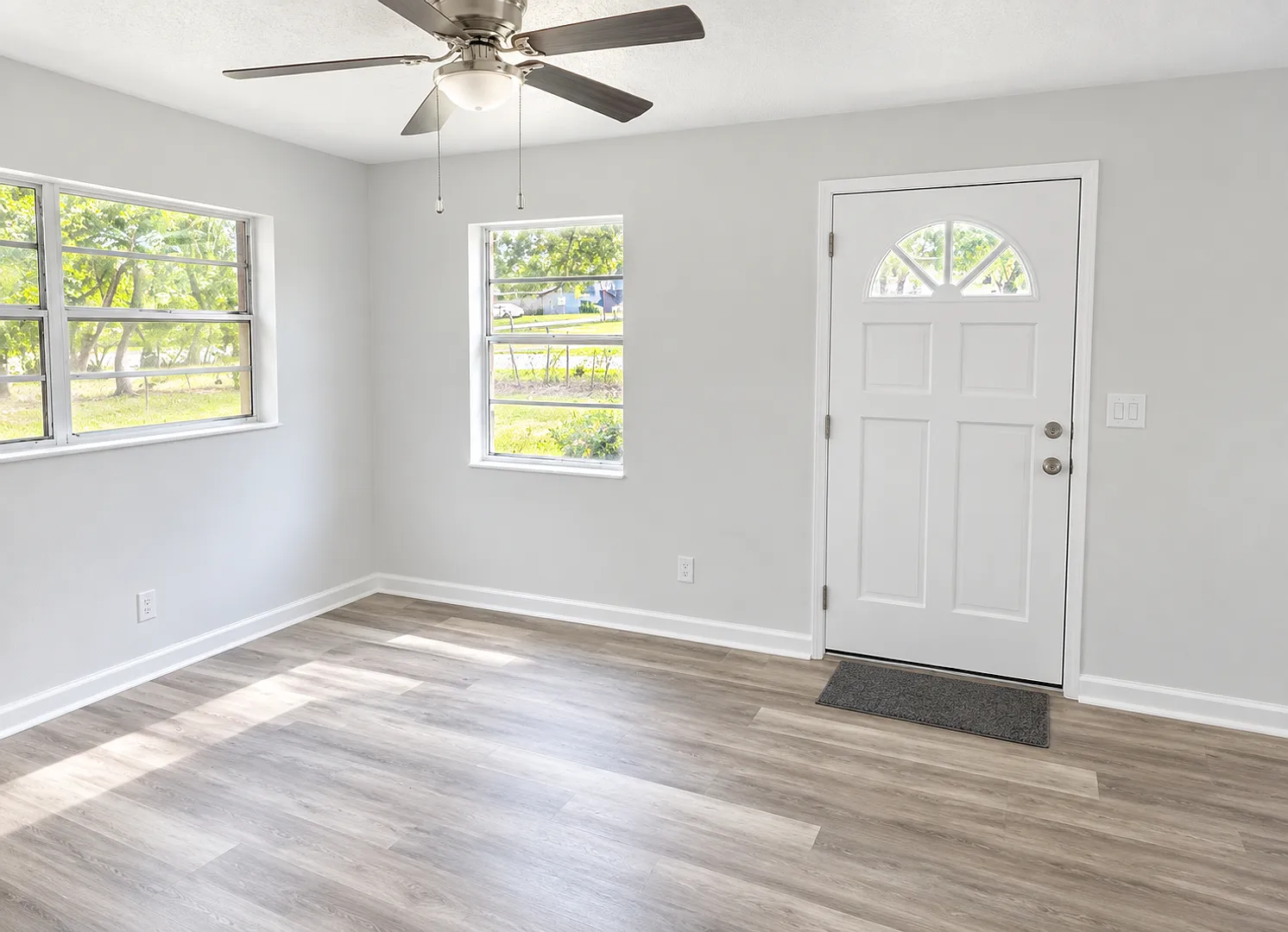 Get ready for this charming 2-bedroom, 2-bathroom home coming soon to Ocala! 2 Living room areas — Photo 2