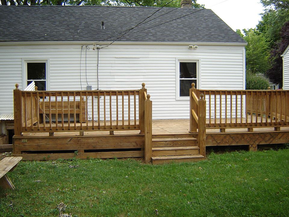 large deck with fenced yard