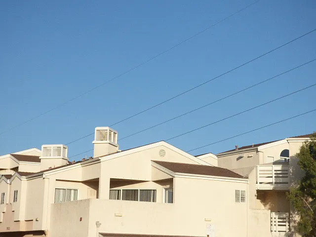 Location is upstairs corner location with private patio