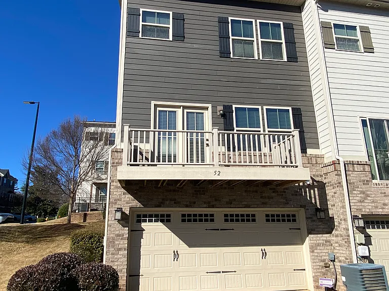 2 car garage in basement, deck off 2nd floor