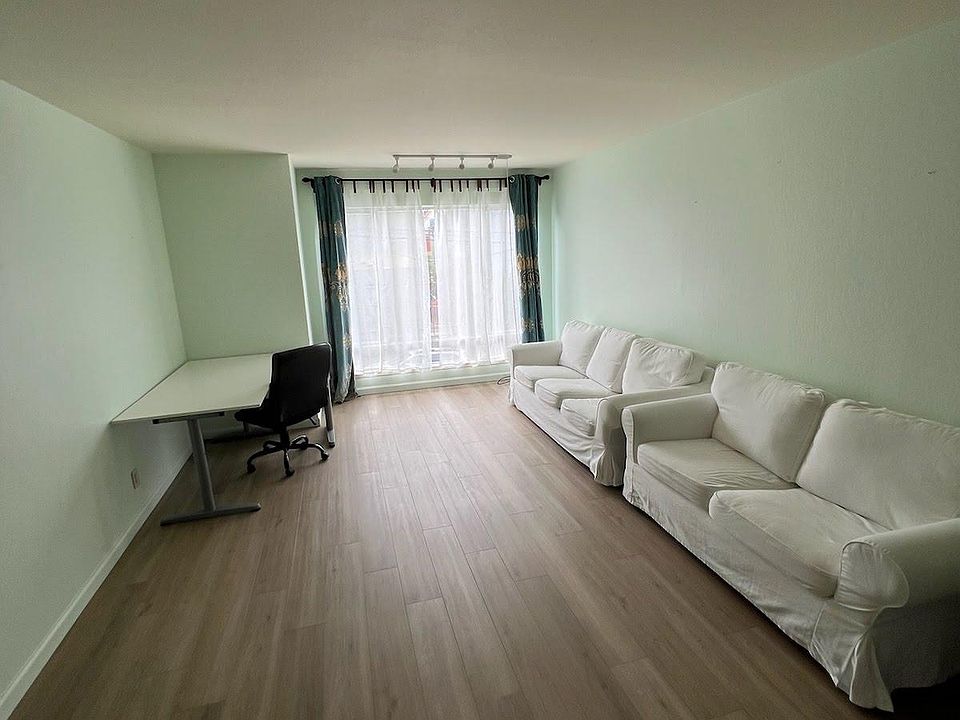 Living room with new laminate wood floors