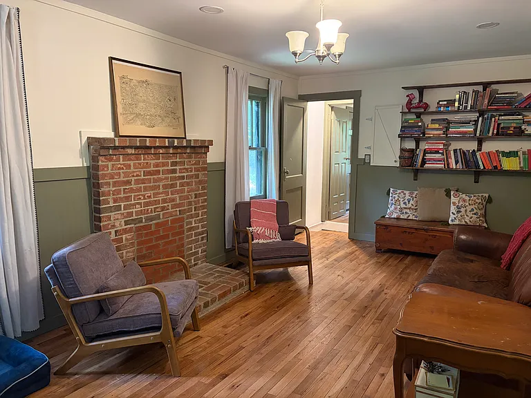 Living room with brick mantlepiece