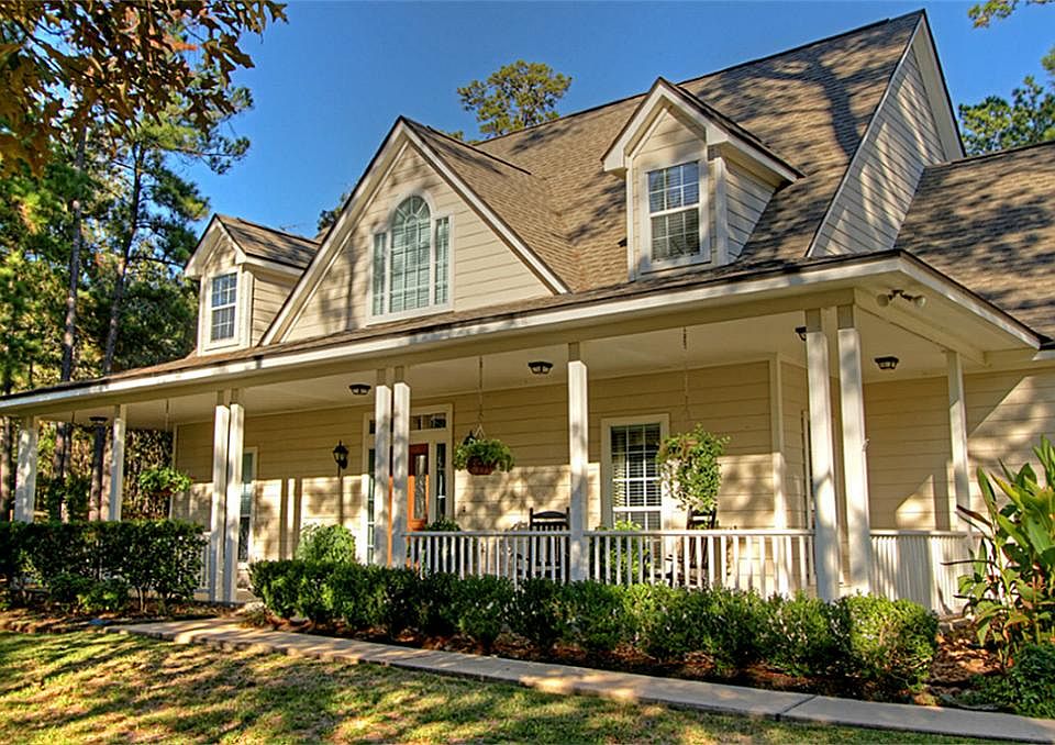 Large corner lot on 2+ acres within walking distance to the neighborhood lake!