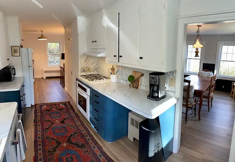 Galley Kitchen. Dining room off to right.