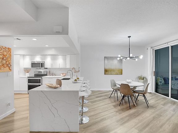 4th image of 4130 W Palm Aire Drive #302D