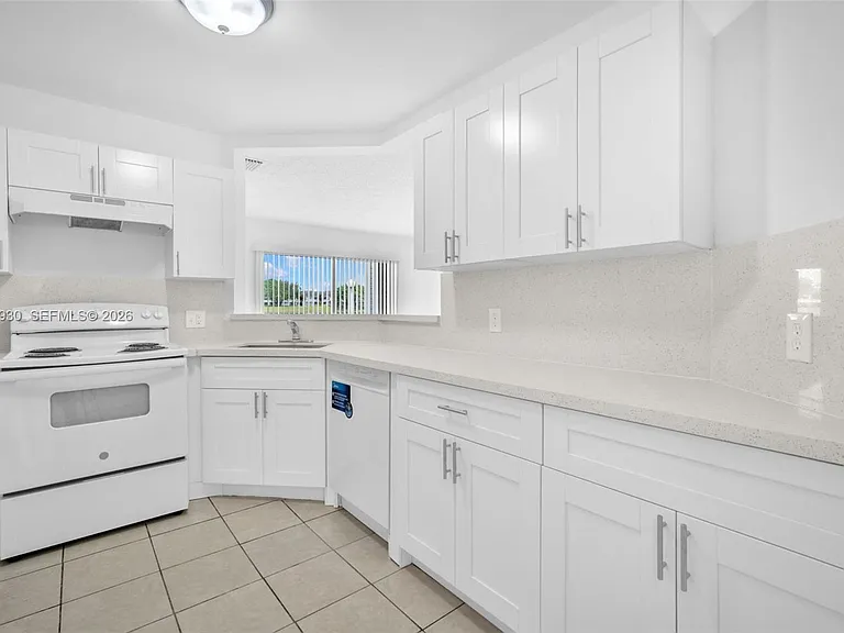 3437 NW 44th St #107 — Photo 11