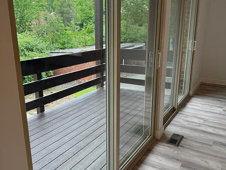 Double sliding glass doors to new deck