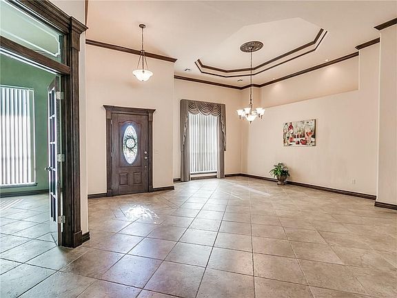 Notice the elegant ceilings of this Formal Dining Room.  The unique ceilings are a great feature throughout this stunning home.