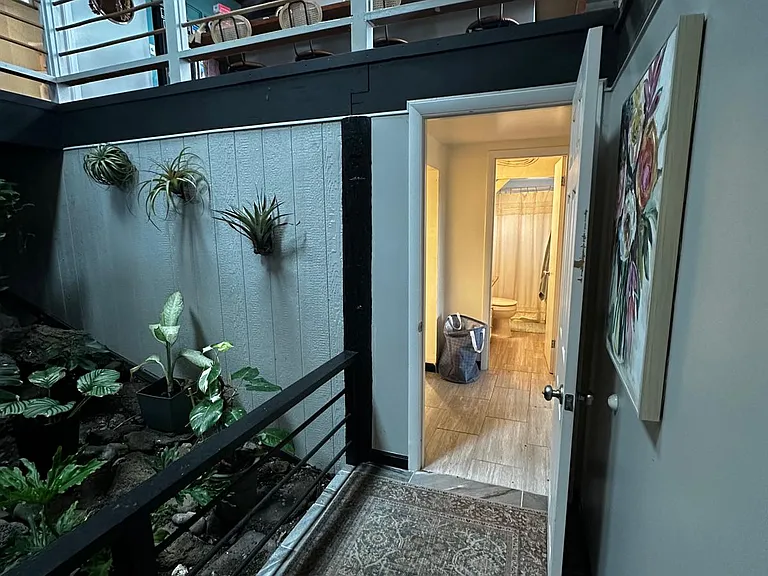 Lower atrium looking into bathroom of the nursery