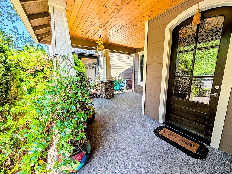 Entrance porch. Fits 4 patio chairs with a small round table comfortably. Especially for parents when kids are playing in the cul-de-sac
