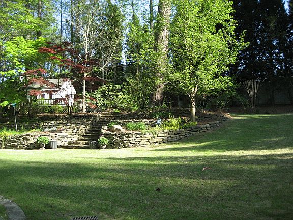 Great backyard with playhouse!