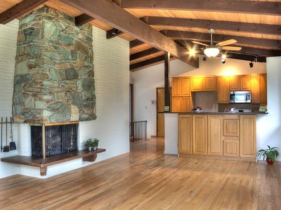 BC Jade Wood-Burning Fireplace and Remote Ceiling Fan Accent the Living and Dining Areas!