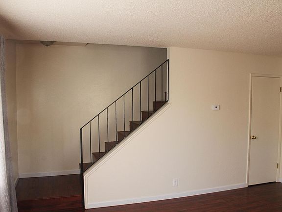 Living Room and Stairs to 2nd Floor