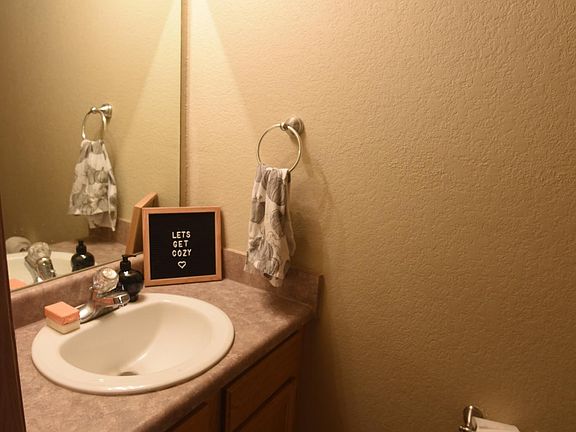 Half bathroom near kitchen