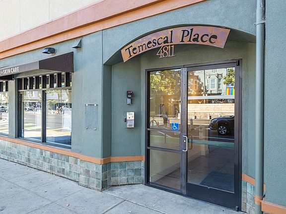 Main entrance of the building with secured access entry.